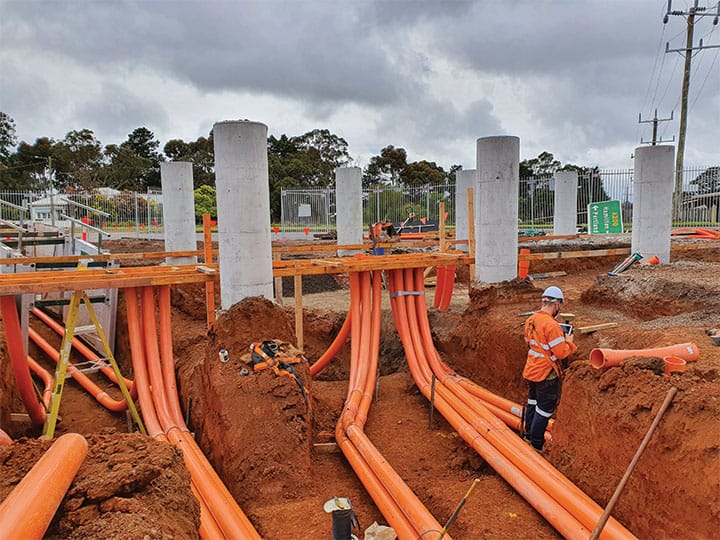 Orange electrical conduit banks trenched into a JPR civil subdivision site