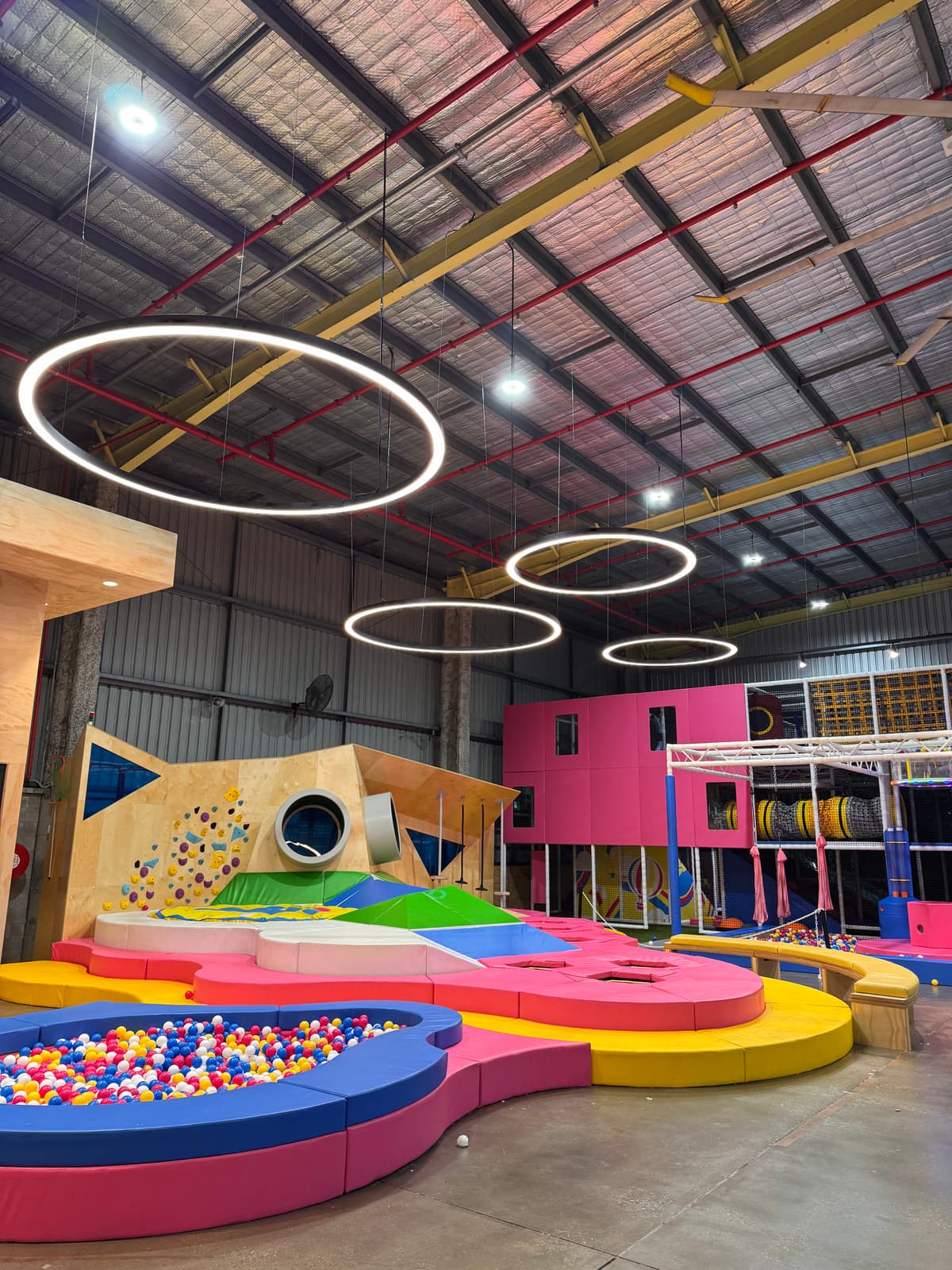 Indoor play centre electrical fitout with feature ring pendant lighting by JPR